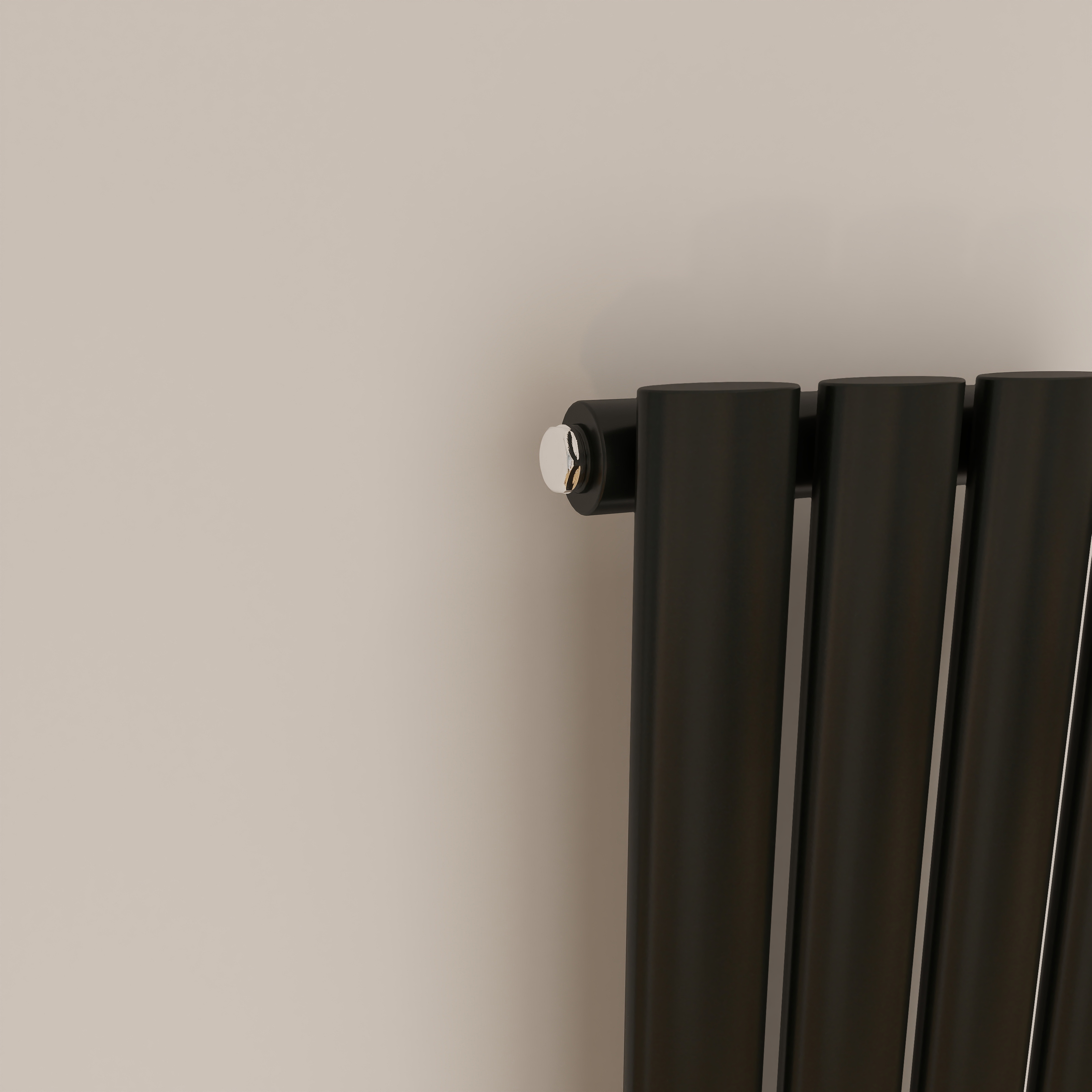 Close-up of a Black Single Panel Oval Column Radiator with Valves, showing the Oval Tube Detail.